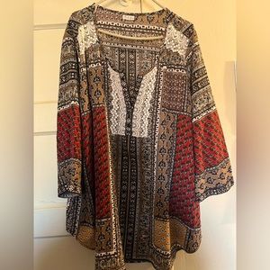 Antilia Femme’s blouse in brown, tan and red patterns